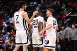Nov 28, 2025; Inglewood, California, USA;  Memphis Grizzlies forward Santi Aldama (7) and guard Cam Spencer (24) celebrate a victory after defeating the Los Angeles Clippers 112-107 at Intuit Dome. Mandatory Credit: Kiyoshi Mio-Imagn Images