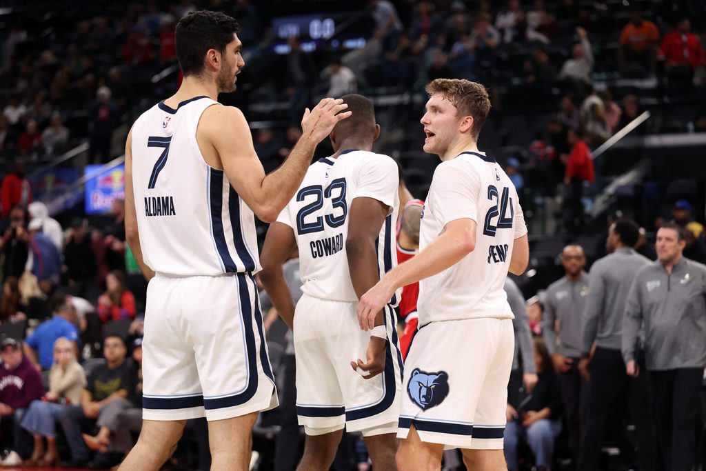 Nov 28, 2025; Inglewood, California, USA; Memphis Grizzlies forward Santi Aldama (7) and guard Cam Spencer (24) celebrate a victory after defeating the Los Angeles Clippers 112-107 at Intuit Dome. Mandatory Credit: Kiyoshi Mio-Imagn Images