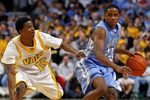 Dec 20, 2008; Chicago, IL, USA; North Carolina Tar Heels guard Larry Drew II (11) brings the ball up the court against Valparaiso Crusaders guard Erik Buggs (15) during the first half at the United Center. Mandatory Credit: Jerry Lai-Imagn Images