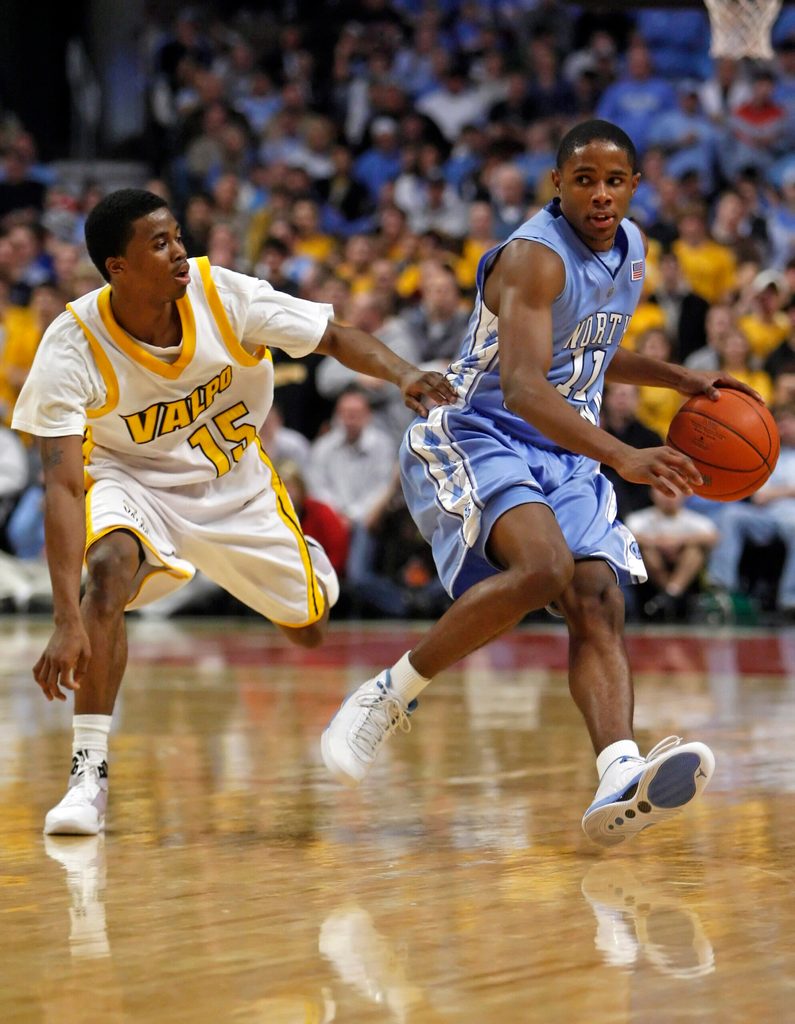 Dec 20, 2008; Chicago, IL, USA; North Carolina Tar Heels guard Larry Drew II (11) brings the ball up the court against Valparaiso Crusaders guard Erik Buggs (15) during the first half at the United Center. Mandatory Credit: Jerry Lai-Imagn Images