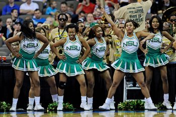 Mar 16, 2012; Omaha, NE, USA; The Norfolk State Spartans cheerleaders perform during a game a game against the Missouri Tigers in the second round of the 2012 NCAA men's basketball tournament at the Century Link Center.  Norfolk State defeated Missouri 86-84.  Mandatory Credit: Peter G. Aiken-Imagn Images