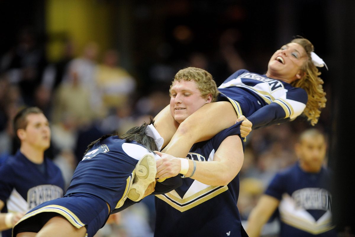 Mar 16, 2013; Cleveland, OH, USA; Akron Zips cheerleaders perform during the championship game against the Ohio Bobcats in the MAC tournament at Quicken Loans Arena. Mandatory Credit: Eric P. Mull-Imagn Images