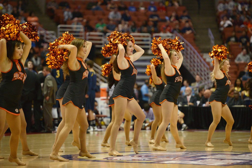 Mar 16, 2013; Anaheim, CA, USA; Pacific Tigers cheerleaders perform during a break in play between the Pacific Tigers and UC Irvine Anteaters in the first half during the championship game of the Big West tournament at the Honda Center. Mandatory Credit: Kelvin Kuo-Imagn Images