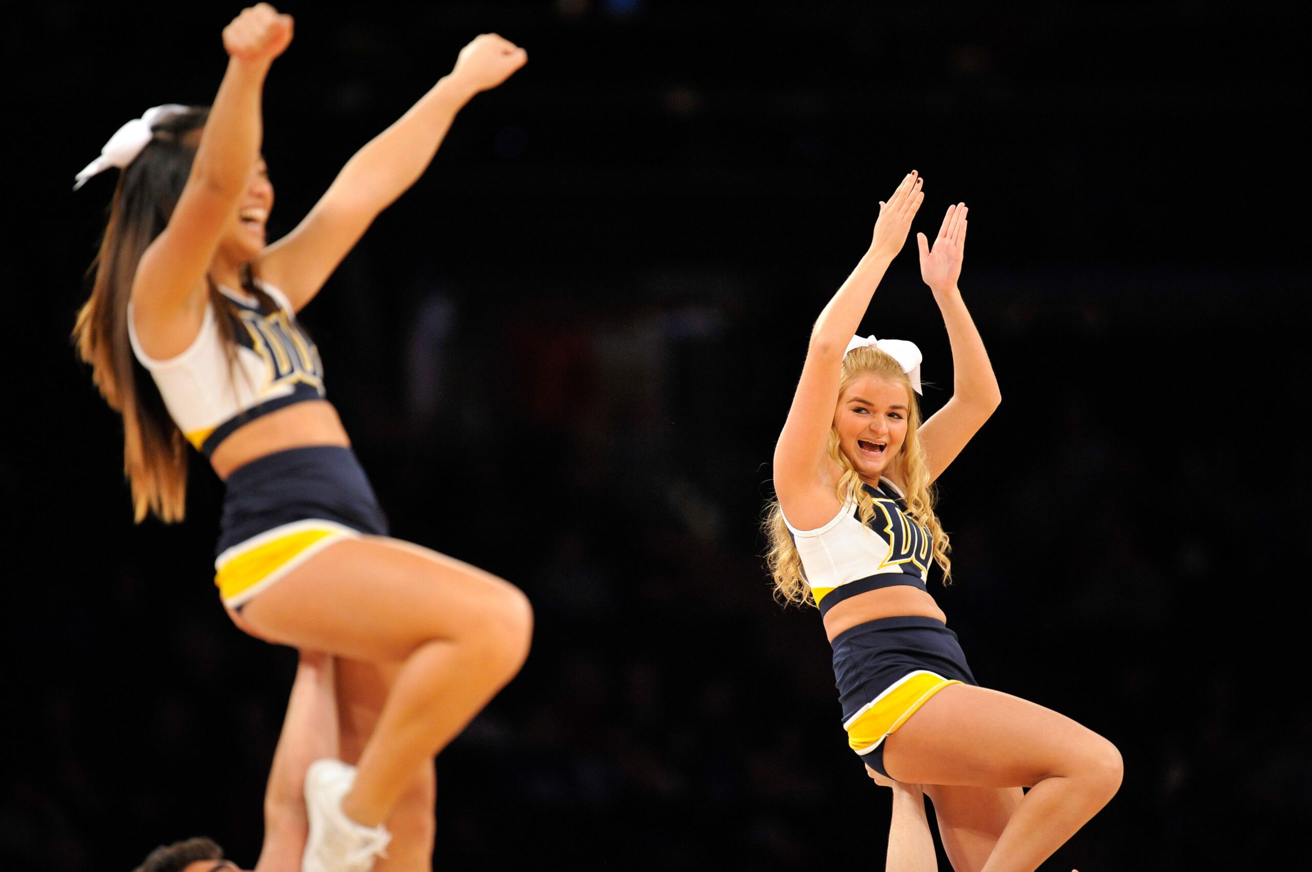 Nov 29, 2013; New York, NY, USA; Drexel Dragons cheerleaders perform against the Alabama Crimson Tide during the NIT Season Tip-Off at Madison Square Garden. Drexel won the game 85-83 in triple overtime. Mandatory Credit: Joe Camporeale-Imagn Images