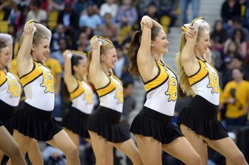 Dec 19, 2013; Long Beach, CA, USA; Long Beach State 49ers dance team cheerleaders perform during the game against the Southern California Trojans at Walter Pyramid. Mandatory Credit: Kirby Lee-Imagn Images