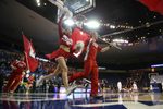 Mar 16, 2014; New Orleans, LA, USA; Louisiana Lafayette Ragin Cajuns cheerleaders lead the team onto the court prior to tipoff against the Georgia State Panthers in the championship game of the Sun Belt Conference college basketball tournament at Lakefront Arena. Louisiana Lafayette defeated Georgia State 82-81. Mandatory Credit: Crystal LoGiudice-Imagn Images