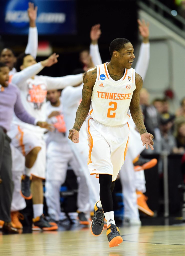 Mar 23, 2014; Raleigh, NC, USA; Tennessee Volunteers guard Antonio Barton (2) reacts to a making a three pinter against the Mercer Bears during the second half of a men's college basketball game during the third round of the 2014 NCAA Tournament at PNC Arena. Mandatory Credit: Bob Donnan-Imagn Images