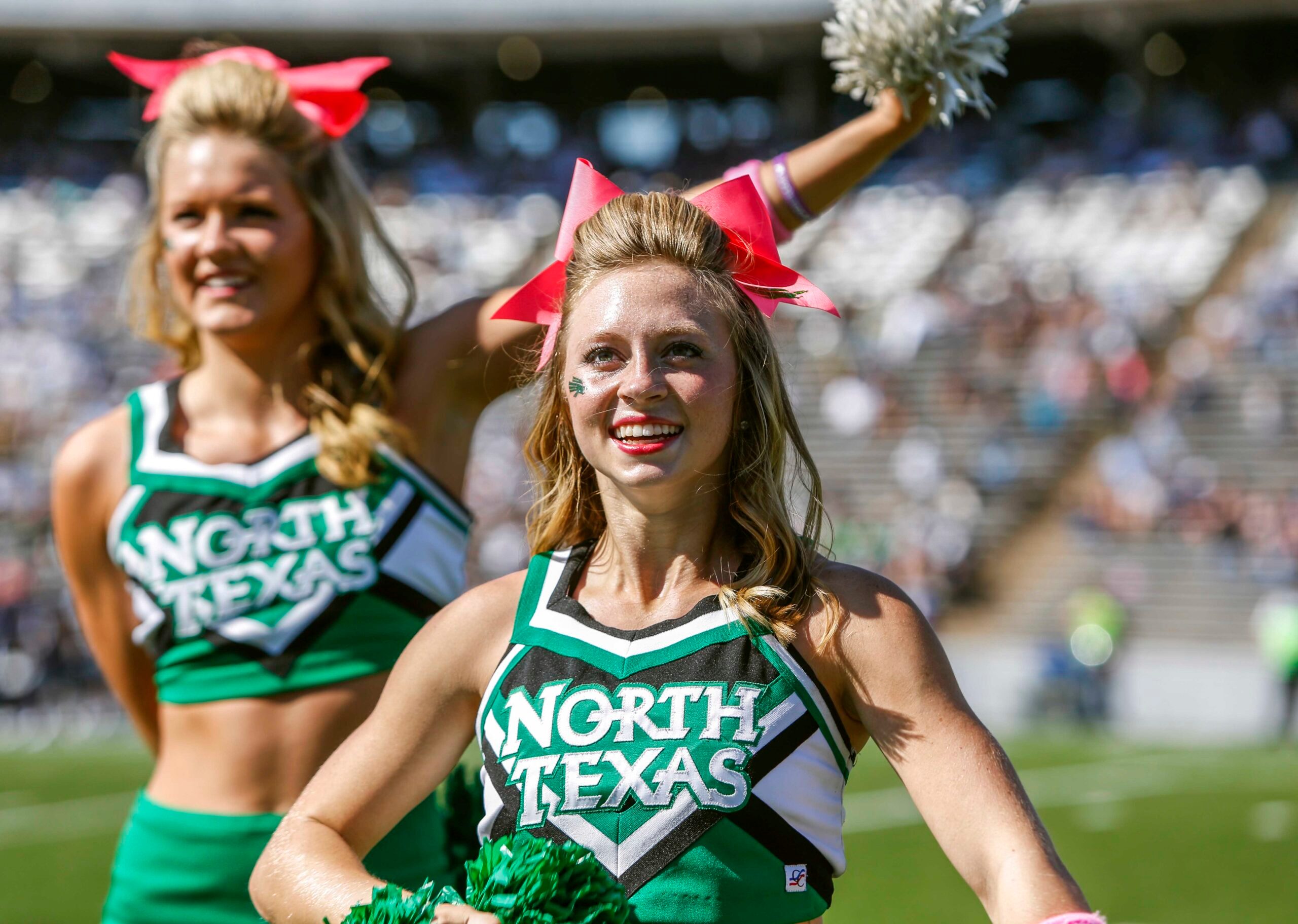 Oct 25, 2014; Houston, TX, USA; North Texas Mean Green cheerleaders perform during a game against the Rice Owls at Rice Stadium. Mandatory Credit: Troy Taormina-Imagn Images