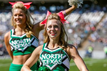 Oct 25, 2014; Houston, TX, USA; North Texas Mean Green cheerleaders perform during a game against the Rice Owls at Rice Stadium. Mandatory Credit: Troy Taormina-Imagn Images