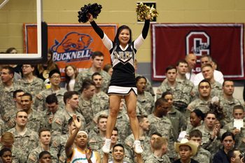 Jan 10, 2015; West Point, NY, USA; An Army Black Knights cheerleader performs during the second half against the Navy Midshipmen at Christl Arena. Mandatory Credit: Danny Wild-Imagn Images