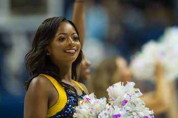 Dec 27, 2016; Chattanooga, TN, USA; Chattanooga Lady Mocs cheerleader cheering before a game against the Notre Dame Fighting Irish at McKenzie Arena. Mandatory Credit: Bryan Lynn-Imagn Images