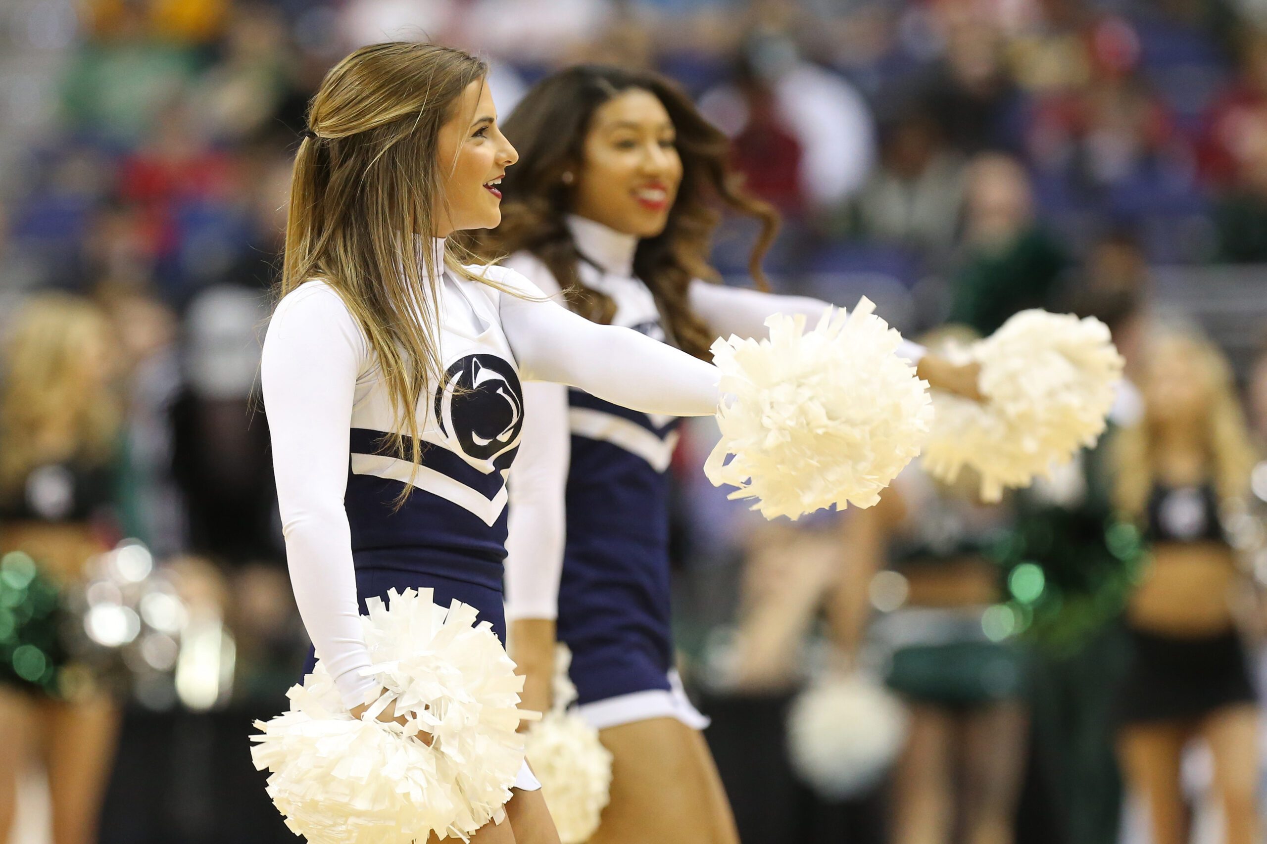 Mar 9, 2017; Washington, DC, USA; Penn State Nittany Lions cheerleaders cheer on the court during a timeout against the Michigan State Spartans Lamar Stevens (11) in the second half during the Big Ten Conference Tournament at Verizon Center. The Spartans won 78-51. Mandatory Credit: Geoff Burke-Imagn Images