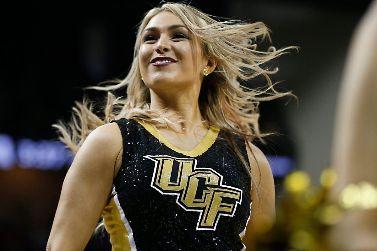 Jan 31, 2018; Orlando, FL, USA; A UCF Knights cheerleader performs during the second half against the Connecticut Huskies at CFE Federal Credit Union Arena. Mandatory Credit: Reinhold Matay-Imagn Images