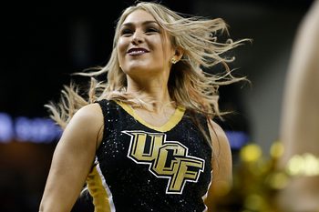 Jan 31, 2018; Orlando, FL, USA; A UCF Knights cheerleader performs during the second half against the Connecticut Huskies at CFE Federal Credit Union Arena. Mandatory Credit: Reinhold Matay-Imagn Images