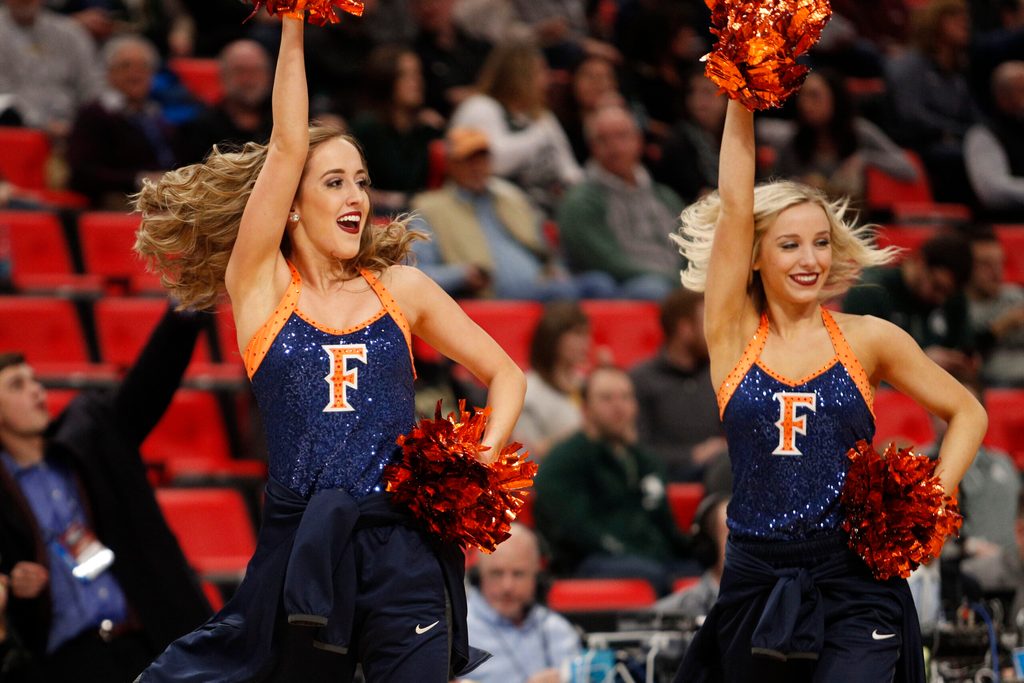Mar 16, 2018; Detroit, MI, USA; Cal State Fullerton Titans cheerleaders in the first half in the game against the Purdue Boilermakers in the first round of the 2018 NCAA Tournament at Little Caesars Arena. Mandatory Credit: Raj Mehta-Imagn Images