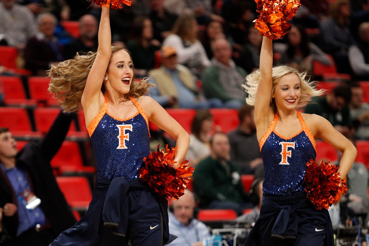 Mar 16, 2018; Detroit, MI, USA; Cal State Fullerton Titans cheerleaders in the first half in the game against the Purdue Boilermakers in the first round of the 2018 NCAA Tournament at Little Caesars Arena. Mandatory Credit: Raj Mehta-Imagn Images
