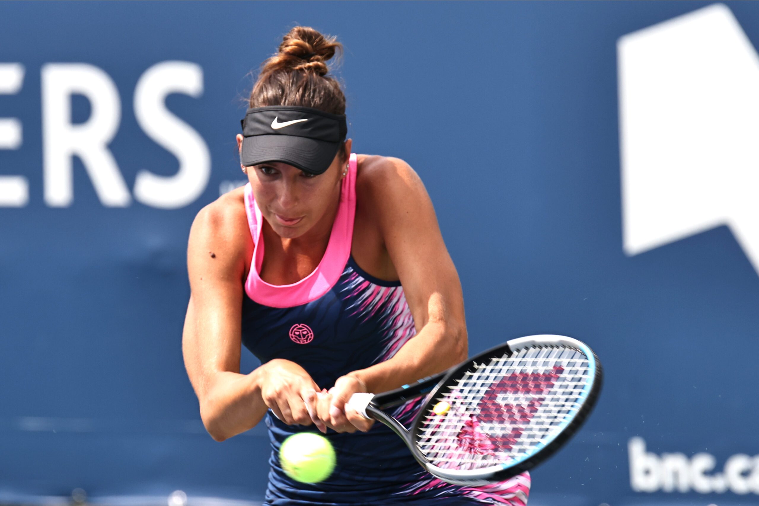 Aug 11, 2021; Montreal, Quebec, Canada; Oceane Dodin from France hits a shot against Amanda Anisimova from USA (not pictured) during the second round play at Stade IGA. Mandatory Credit: Jean-Yves Ahern-Imagn Images