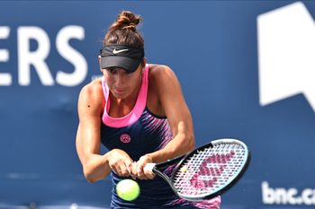 Aug 11, 2021; Montreal, Quebec, Canada; Oceane Dodin from France hits a shot against Amanda Anisimova from USA (not pictured) during the second round play at Stade IGA. Mandatory Credit: Jean-Yves Ahern-Imagn Images