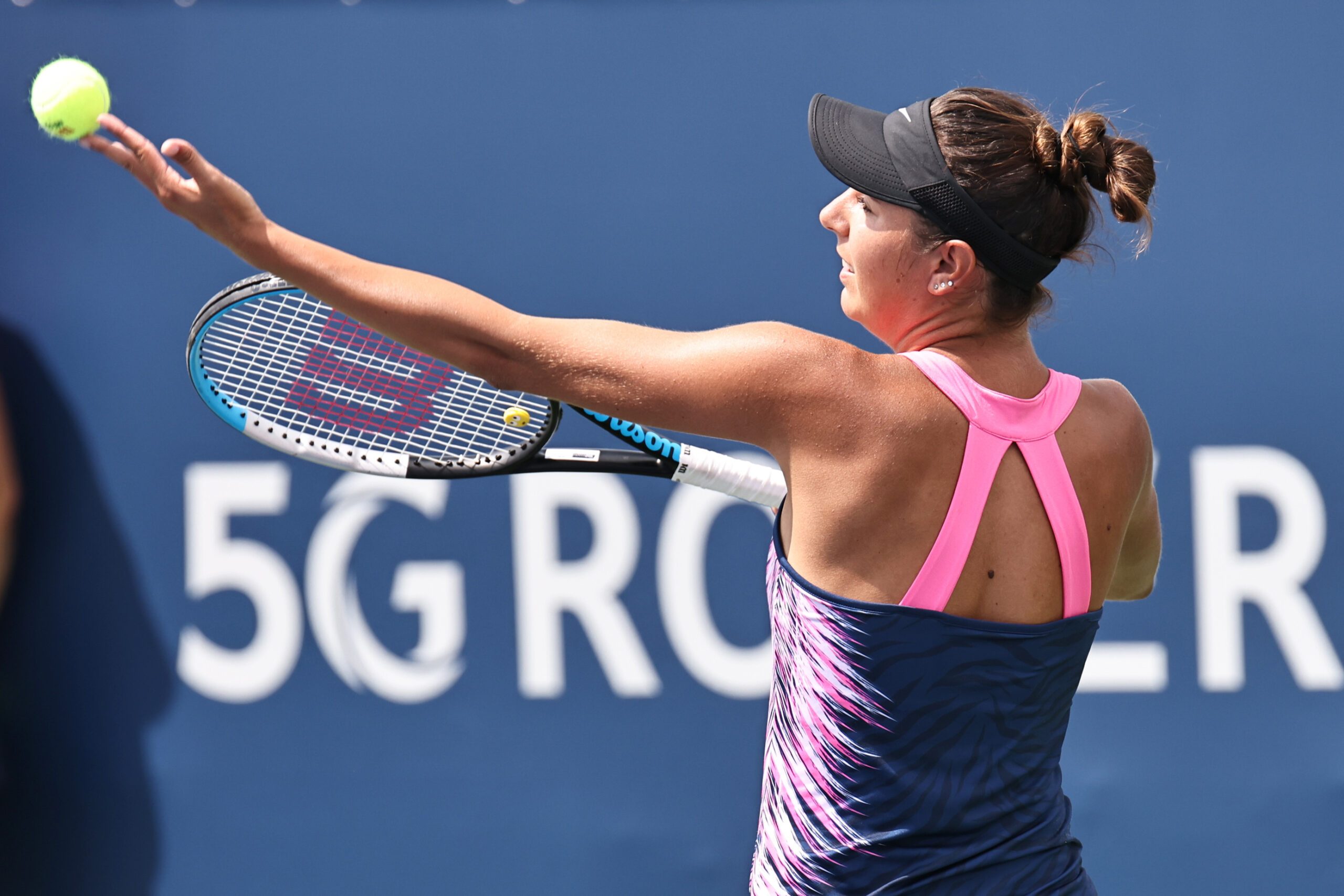Aug 11, 2021; Montreal, Quebec, Canada; Oceane Dodin from France serves against Amanda Anisimova from USA (not pictured) during the second round play at Stade IGA. Mandatory Credit: Jean-Yves Ahern-Imagn Images