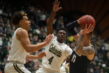 CSU's John Tonje and Isaiah Stevens defend the net against Oral Roberts' Carlos Jurgens during the men's basketball season opener on Tuesday, Nov. 9, 2021, at Moby Arena in Fort Collins.

Ftc 1109 Ja Csu Or Mbball 006