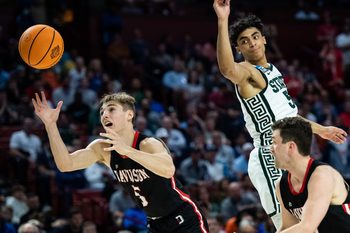 Davidson College guard Grant Huffman (5) attempts to gain possession of the ball against Michigan State University  during the NCAA Men's Division I Basketball Tournament at the Bon Secours Wellness Arena Friday, March 18, 2022.

Jm Michigan 031822 008