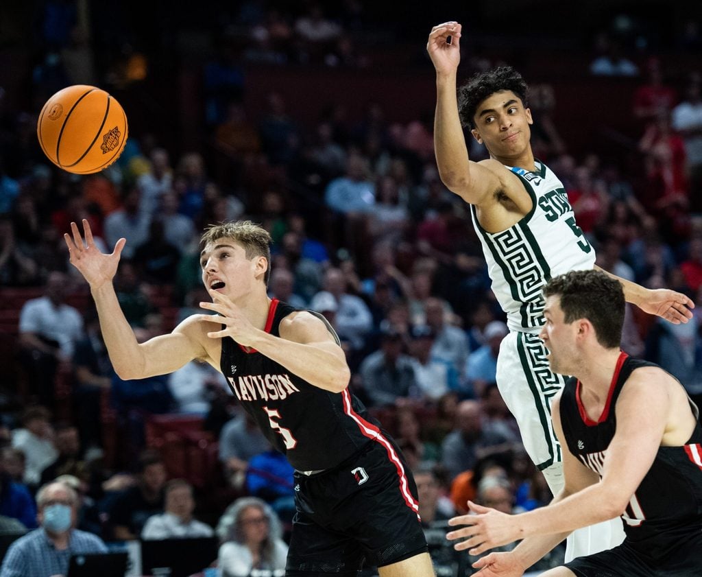 Davidson College guard Grant Huffman (5) attempts to gain possession of the ball against Michigan State University during the NCAA Men's Division I Basketball Tournament at the Bon Secours Wellness Arena Friday, March 18, 2022.
Jm Michigan 031822 008