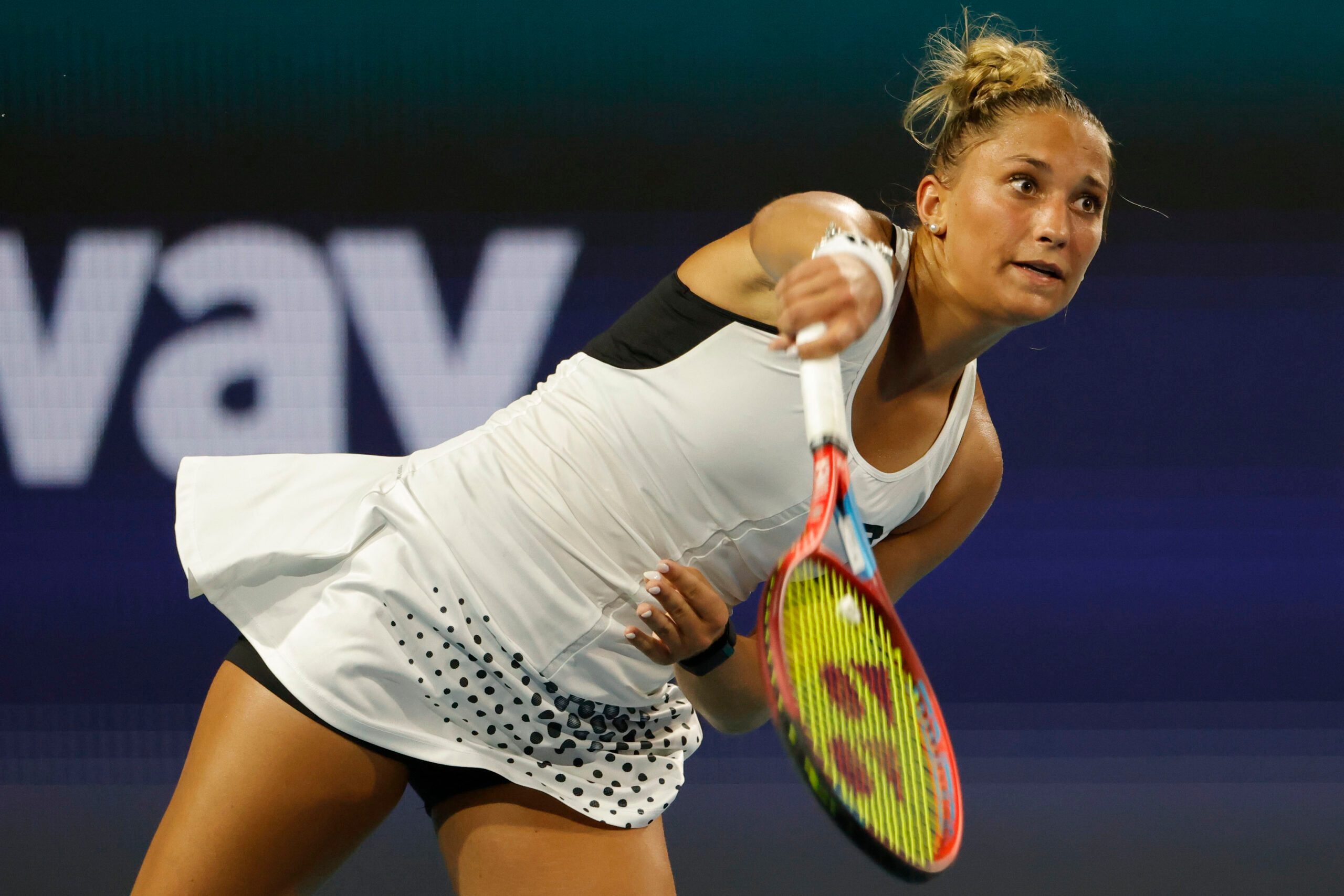 Mar 23, 2022; Miami Gardens, FL, USA; Panna Udvardy (HUN) serves against Sloane Stephens (USA) (not pictured) in a first round women's singles match in the Miami Open at Hard Rock Stadium. Mandatory Credit: Geoff Burke-Imagn Images
