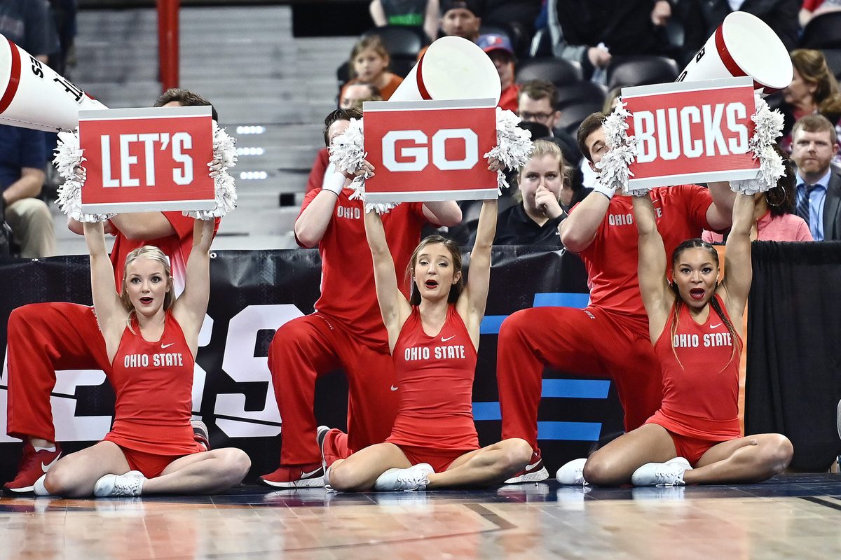 Mar 25, 2022; Spokane, WA, USA; Ohio State Buckeyes cheerleaders hold up sign against the Texas Longhorns in the Spokane regional semifinals of the women's college basketball NCAA Tournament at Spokane Veterans Memorial Arena. Mandatory Credit: James Snook-Imagn Images