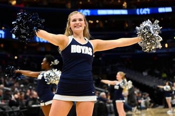 Dec 16, 2022; Washington, District of Columbia, USA; Georgetown Hoyas cheerleader on the court against the Xavier Musketeers during the first half at Capital One Arena. Mandatory Credit: Brad Mills-Imagn Images