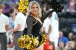 Mar 9, 2023; Las Vegas, NV, USA; A Colorado Buffaloes cheerleader entertains the crowd during a game between the Buffaloes and the UCLA Bruins during the second half at T-Mobile Arena. Mandatory Credit: Stephen R. Sylvanie-Imagn Images