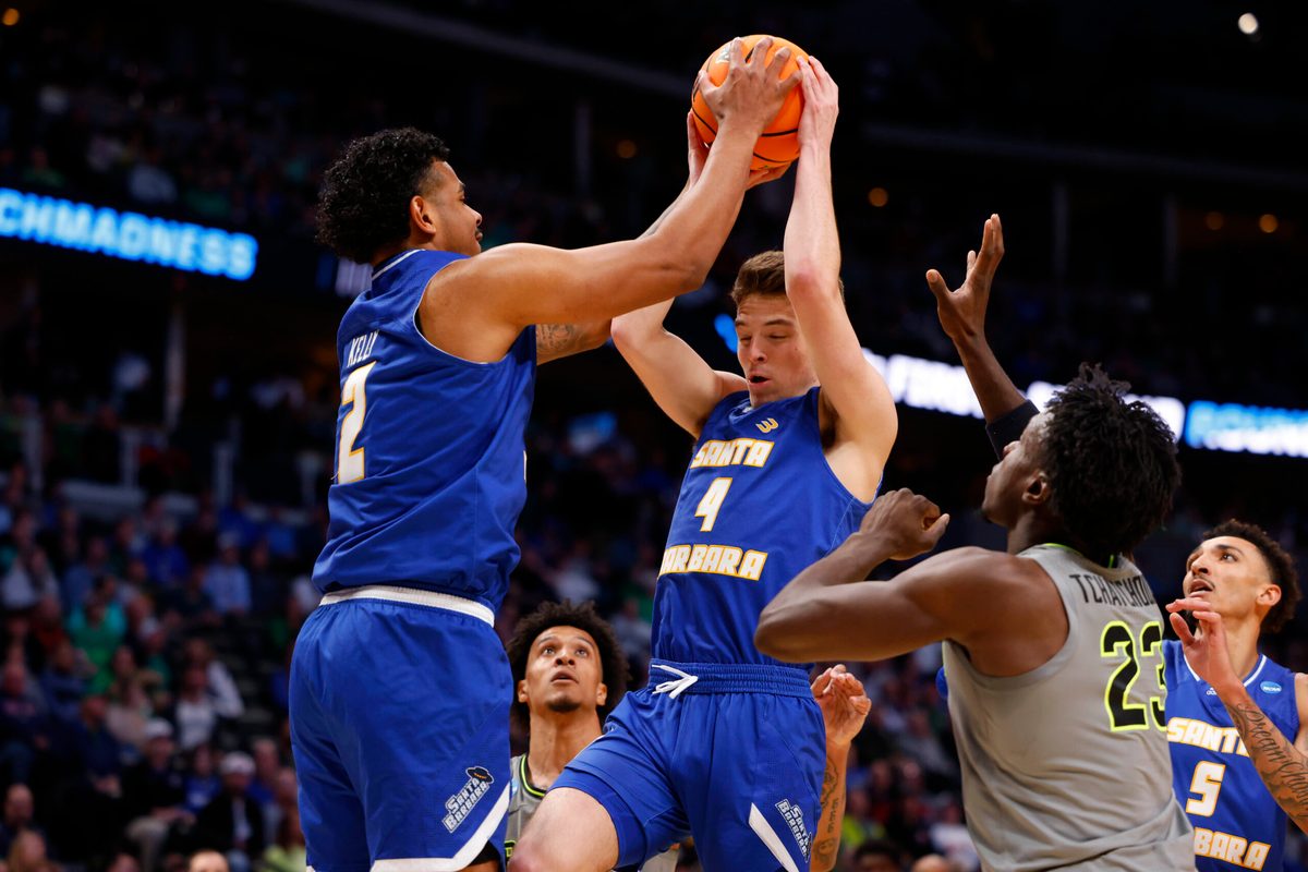 Mar 17, 2023; Denver, CO, USA;  UC Santa Barbara Gauchos guard Cole Anderson (4) handles the ball against Baylor Bears forward Jonathan Tchamwa Tchatchoua (23) during the second half in the first round of the 2023 NCAA men   s basketball tournament at Ball Arena. Mandatory Credit: Michael Ciaglo-Imagn Images