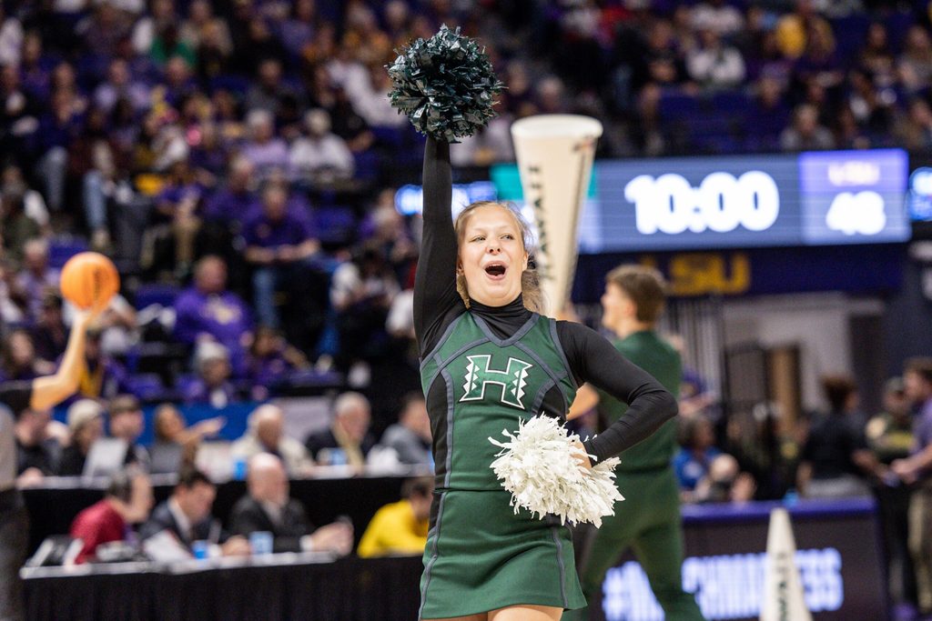 Mar 17, 2023; Baton Rouge, LA, USA; Hawai'i Rainbow Wahine cheerleaders perform against the LSU Lady Tigers during the second half at Pete Maravich Assembly Center. Mandatory Credit: Stephen Lew-Imagn Images