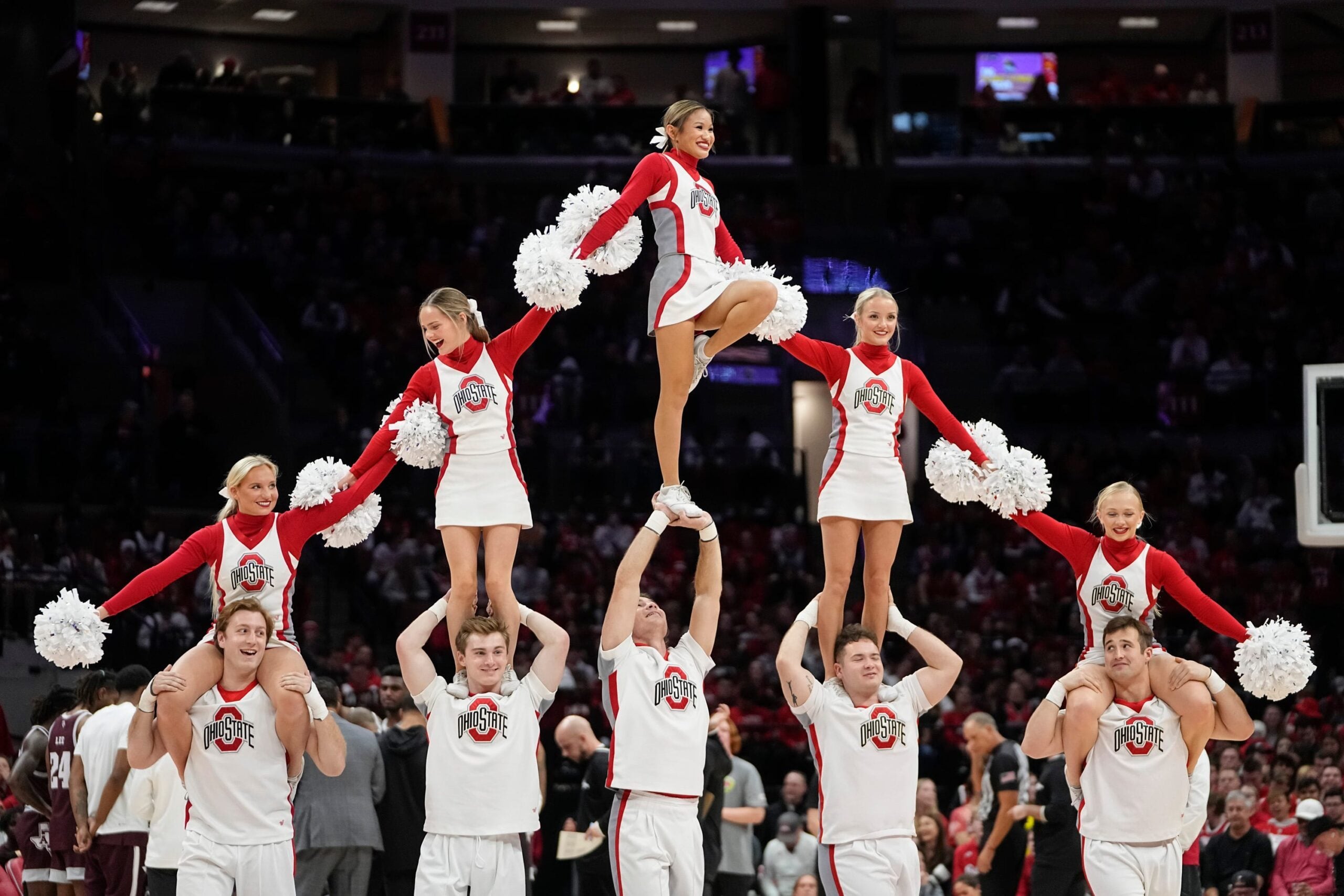 Nov 10, 2023; Columbus, Ohio, USA; Ohio State Buckeyes cheerleaders perform during the second half of the NCAA basketball game against the Texas A&M Aggies at Value City Arena. Ohio State lost 73-66.