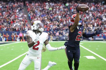 Nov 19, 2023; Houston, Texas, USA; Houston Texans cornerback Steven Nelson (21) deflects a pass intended for Arizona Cardinals wide receiver Marquise Brown (2) during the fourth quarter at NRG Stadium. Mandatory Credit: Troy Taormina-Imagn Images