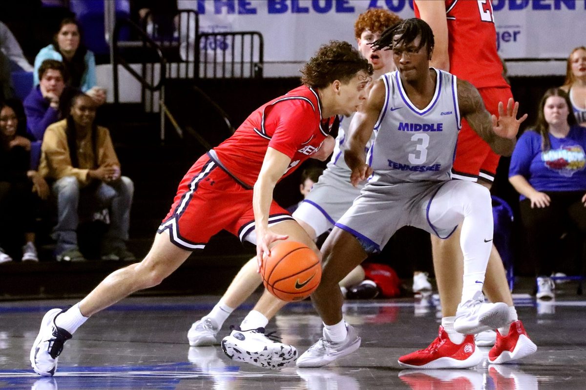 Belmont guard Keishawn Davidson (3) moves the ball around the court as Middle Tennessee guard Jestin Porter (3) guards him during the men s basketball game on Saturday, Dec. 9, 2023, at MTSU..