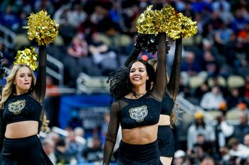 Mar 21, 2024; Pittsburgh, PA, USA; The Oakland Golden Grizzlies cheerleading squad during the second half in the first round of the 2024 NCAA Tournament at PPG Paints Arena. Mandatory Credit: Charles LeClaire-Imagn Images