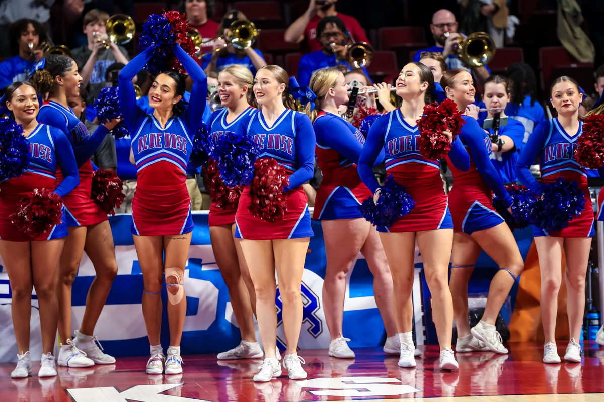 Mar 22, 2024; Columbia, SC, USA; Presbyterian Blue Hose cheerleaders cheer their team against the South Carolina Gamecocks in the second half at Colonial Life Arena. Mandatory Credit: Jeff Blake-Imagn Images