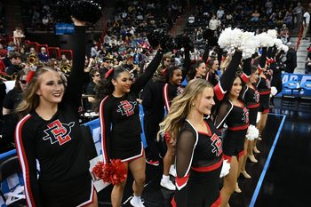 Mar 24, 2024; Spokane, WA, USA; San Diego State Aztecs cheerleaders preform in the second half against the Yale Bulldogs at Spokane Veterans Memorial Arena. Mandatory Credit: James Snook-Imagn Images
