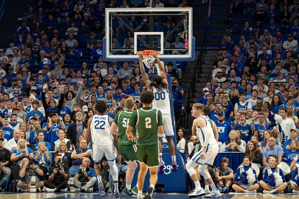Kentucky's Otega Oweh (00) slammed down two points during the Wildcats' season-opening game against Wright State at Rupp Arena in Lexington, Ky. The Wildcats defeated the Raiders 103-62. November 4, 2024.