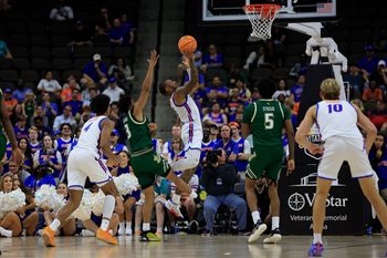 Florida Gators guard Alijah Martin (15) drives to the basket during the second half of an NCAA men’s basketball matchup Monday, Nov. 4, 2024 at VyStar Veterans Memorial Arena in Jacksonville, Fla. Florida defeated South Florida 98-83. [Corey Perrine/Florida Times-Union]