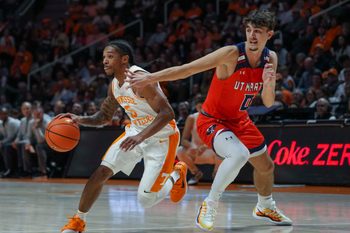 Tennessee guard Zakai Zeigler (5) runs around UT Martin's Andrija Bukumirovic (0) during an NCAA basketball game between the Tennessee Volunteers and UT Martin Skyhawks at Thompson-Boling Arena at Food City Center on Wednesday, Nov. 27, 2024. Mandatory Credit: Angelina Alcantar/USA TODAY NETWORK via Imagn Images