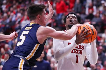 Texas Tech's Kevin Overton is defended by Northern Colorado's Quinn Denker during a non-conference basketball game, Friday, Nov. 29, 2024, at United Supermarkets Arena.