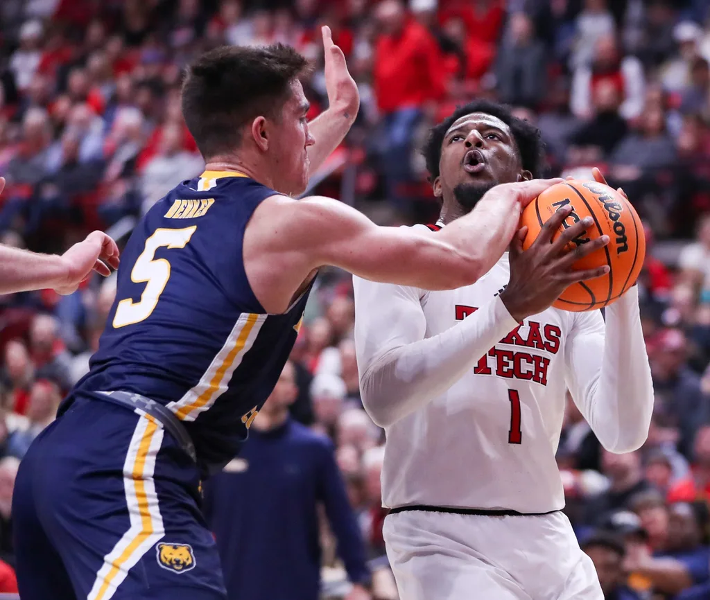 Texas Tech's Kevin Overton is defended by Northern Colorado's Quinn Denker during a non-conference basketball game, Friday, Nov. 29, 2024, at United Supermarkets Arena.