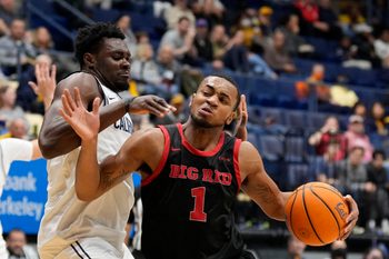 December 10, 2024; Berkeley, California, USA; Cornell Big Red guard Nazir Williams (1) dribbles the basketball against California Golden Bears center Mady Sissoko (12) during the second half at Haas Pavilion. Mandatory Credit: Kyle Terada-Imagn Images