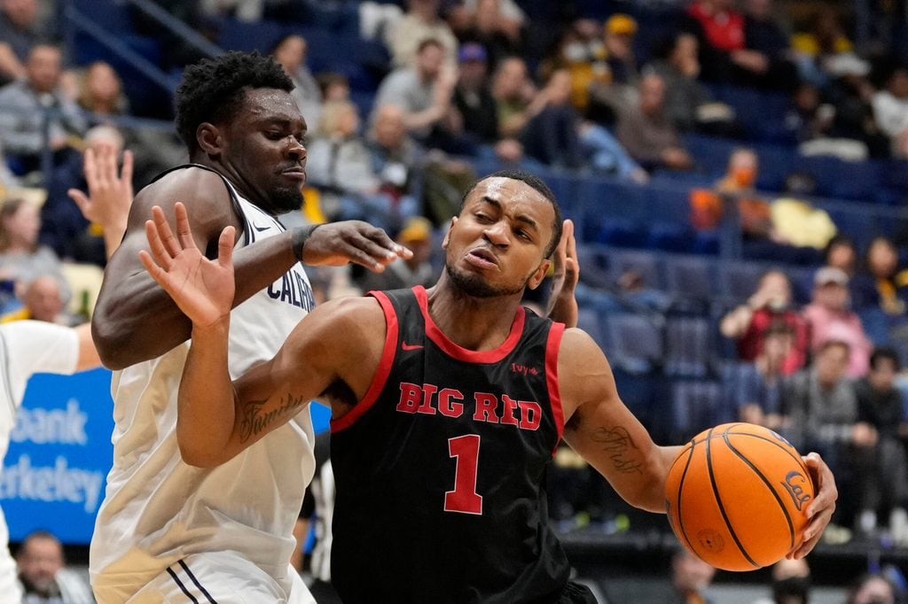 December 10, 2024; Berkeley, California, USA; Cornell Big Red guard Nazir Williams (1) dribbles the basketball against California Golden Bears center Mady Sissoko (12) during the second half at Haas Pavilion. Mandatory Credit: Kyle Terada-Imagn Images
