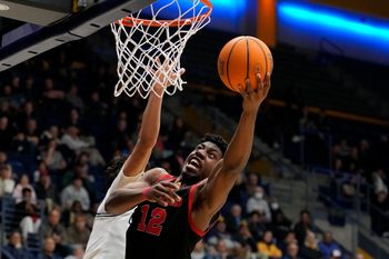 December 10, 2024; Berkeley, California, USA; Cornell Big Red forward AK Okereke (12) shoots the basketball against the California Golden Bears during the second half at Haas Pavilion. Mandatory Credit: Kyle Terada-Imagn Images