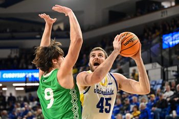 South Dakota State Jackrabbits center Oscar Cluff (45) shoots the ball during the first half on Thursday, Jan. 16, 2025, at the First Bank & Trust Arena in Brookings, S.D.