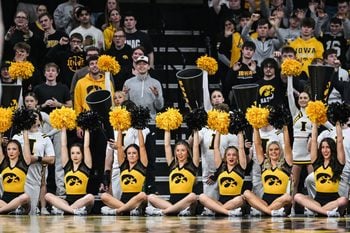 Feb 4, 2025; Iowa City, Iowa, USA; The Iowa Hawkeyes cheerleaders lead the crowd during the second half against the Purdue Boilermakers at Carver-Hawkeye Arena. Mandatory Credit: Jeffrey Becker-Imagn Images