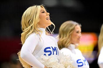 Feb 22, 2025; Dallas, Texas, USA; The SMU Mustangs cheerleaders perform during the second half of the game between the SMU Mustangs and the Clemson Tigers at Moody Coliseum. Mandatory Credit: Jerome Miron-Imagn Images