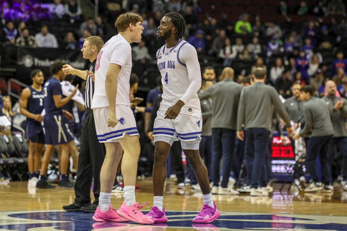 Feb 23, 2025; Newark, New Jersey, USA;  Seton Hall Pirates forward Gus Yalden (19) reacts to a play with forward Prince Aligbe (4) during a timeout against the Xavier Musketeers at Prudential Center. Mandatory Credit: Scott Rausenberger-Imagn Images